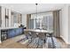 Stylish dining room featuring a large table with seating for six and a built-in bar area at 11327 James Coy Rd, Davidson, NC 28036