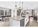 Spacious kitchen features stainless steel appliances, an island with seating, and ample counter space at 11327 James Coy Rd, Davidson, NC 28036