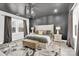 Spacious main bedroom with dark gray walls, a unique ceiling fixture, and an abundance of natural light at 11327 James Coy Rd, Davidson, NC 28036