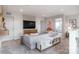 Upstairs living room with mounted TV and stylish decor is perfect for relaxation or entertainment at 13014 Garren View Ln # 306, Charlotte, NC 28278