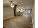 Open-concept living space with wood-look flooring and natural light at 1309 Meadow Ave, Kannapolis, NC 28083