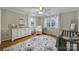 Bright Bedroom with hardwood floors, white furniture, and natural light at 1501 Laurel Ln, Gastonia, NC 28054
