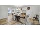 Classic dining room featuring a wood table, upholstered chairs, and traditional decor at 1501 Laurel Ln, Gastonia, NC 28054