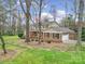 Charming two-story brick home with an attached garage and a well-manicured lawn at 1501 Laurel Ln, Gastonia, NC 28054