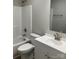 Bright bathroom with a shower-tub combo and modern vanity at 1537 Poston Cir, Gastonia, NC 28054