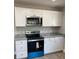 Kitchen features stainless appliances, granite countertops, and white cabinets at 1537 Poston Cir, Gastonia, NC 28054