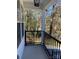 View from a covered porch with black railings at 1537 Poston Cir, Gastonia, NC 28054