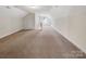 Spacious finished bonus room with neutral walls, carpet and natural light at 15827 Arabian Mews Ln, Charlotte, NC 28278