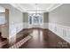 Elegant dining room with hardwood floors and a bay window at 15827 Arabian Mews Ln, Charlotte, NC 28278