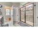 Elegant bathroom showcasing a glass-enclosed shower with decorative tiles and a separate toilet area at 1823 Rain Forest Dr, York, SC 29745