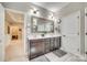 Beautiful bathroom featuring a double vanity with marble countertops and a decorative mirror at 1823 Rain Forest Dr, York, SC 29745