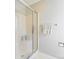 Bathroom with a glass shower door, a towel rack, and a neutral color scheme at 207 Crossing Ave, Belmont, NC 28012