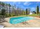 Backyard with an in-ground pool, patio area, and fencing at 207 Crossing Ave, Belmont, NC 28012