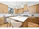 Kitchen featuring an island with marble countertop and stainless steel appliances at 2969 Beech Nut Rd, Charlotte, NC 28208