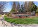 Well-maintained Castlebrooke community entrance featuring stone signage and lush landscaping at 3181 Helmsley Ct, Concord, NC 28027