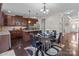 Bright kitchen with stainless appliances, stone countertops, central island and breakfast nook at 3181 Helmsley Ct, Concord, NC 28027