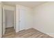 Empty bedroom featuring neutral walls and floors with a single door closet and entryway at 3701 Teaberry Ct, Charlotte, NC 28227