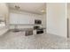 Kitchen featuring modern countertops, stainless steel appliances, and white cabinetry at 3701 Teaberry Ct, Charlotte, NC 28227
