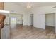 Spacious living area with new floors offering an inviting view of an open floor plan at 3701 Teaberry Ct, Charlotte, NC 28227