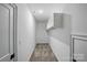 Walk-in closet featuring neutral carpet, shelving and an overhead light at 409 Henry Chapel Rd, Belmont, NC 28012