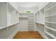 Walk-in closet with custom shelving and storage options, providing ample space at 409 Henry Chapel Rd, Belmont, NC 28012