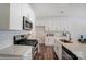 Updated kitchen with white cabinets, subway tile backsplash, and stainless-steel appliances at 4211 Black Ct # 193, Harrisburg, NC 28075