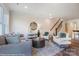 Inviting living room with lots of seating, modern decor, and hardwood floors at 4211 Black Ct # 193, Harrisburg, NC 28075