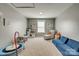 This playroom has fun features such as a trampoline, kitchen set, and cozy chair for playtime at 4219 Huntley Glen Dr, Pineville, NC 28134