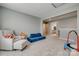 This bonus room is complete with neutral paint and plush carpet, and includes a lounge space and play area at 4219 Huntley Glen Dr, Pineville, NC 28134