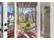 Charming balcony with outdoor seating and a view of the surrounding buildings at 4921 Park Rd # C, Charlotte, NC 28209