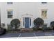 Welcoming entrance with classic design elements and manicured landscaping at 4921 Park Rd # C, Charlotte, NC 28209