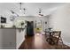 Kitchen with modern appliances and a dining area leading to the balcony at 4921 Park Rd # C, Charlotte, NC 28209