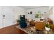 Comfortable living room featuring a stylish rug, furniture, and natural light at 4921 Park Rd # C, Charlotte, NC 28209