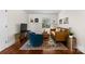Cozy living room showcasing stylish decor and natural light from the window at 4921 Park Rd # C, Charlotte, NC 28209