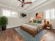 Comfortable bedroom with ample natural light and wood floors at 5426 Milford Rd, Charlotte, NC 28210