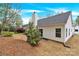 A shot of the backyard with a partial view of the back of the home at 5923 Carriage Oaks Dr, Charlotte, NC 28262