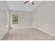Bedroom with neutral carpet, window, and paint at 5923 Carriage Oaks Dr, Charlotte, NC 28262