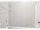 A storage closet with vinyl floor and wire rack shelving at 5923 Carriage Oaks Dr, Charlotte, NC 28262