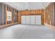 Unfinished garage with visible frame and brick foundation at 5923 Carriage Oaks Dr, Charlotte, NC 28262