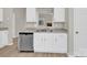 The kitchen offers white cabinets, stone countertops, and stainless steel appliances at 5923 Carriage Oaks Dr, Charlotte, NC 28262