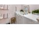 Accessible bathroom with a walk-in tub, grab bars, and comfortable stool at 6301 Park South Dr, Charlotte, NC 28210