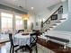 The dining area showcases elegant trim work and provides access to the outdoor patio at 6301 Park South Dr, Charlotte, NC 28210