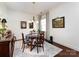 Charming dining area featuring natural light and warm lighting at 6301 Park South Dr, Charlotte, NC 28210