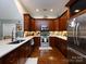 An efficient kitchen design with stainless steel appliances, ample counter space and storage at 6301 Park South Dr, Charlotte, NC 28210