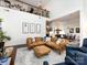 An open living room and second story landing create a lofty atmosphere, with a great view of the dining area at 6301 Park South Dr, Charlotte, NC 28210