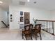 Upstairs living room includes dining area and open access to lower levels at 6301 Park South Dr, Charlotte, NC 28210