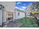 Backyard with a concrete patio, a sliding glass door to the home, and a view of the fenced-in yard at 6310 Windsor Gate Ln # 15, Charlotte, NC 28215