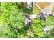 Property and neighborhood aerial shot surrounded by lush greenery at 6628 Cool Water Ct, Charlotte, NC 28215