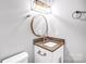 Bathroom featuring a granite countertop vanity with white cabinets and bronze fixtures at 6628 Cool Water Ct, Charlotte, NC 28215
