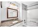 Modern bathroom with granite countertop vanity, white cabinets, and shower-tub combo at 6628 Cool Water Ct, Charlotte, NC 28215